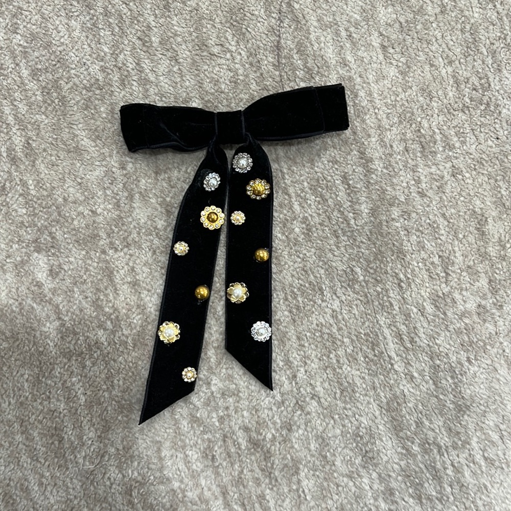 Adorable velvet black bow with floral decor